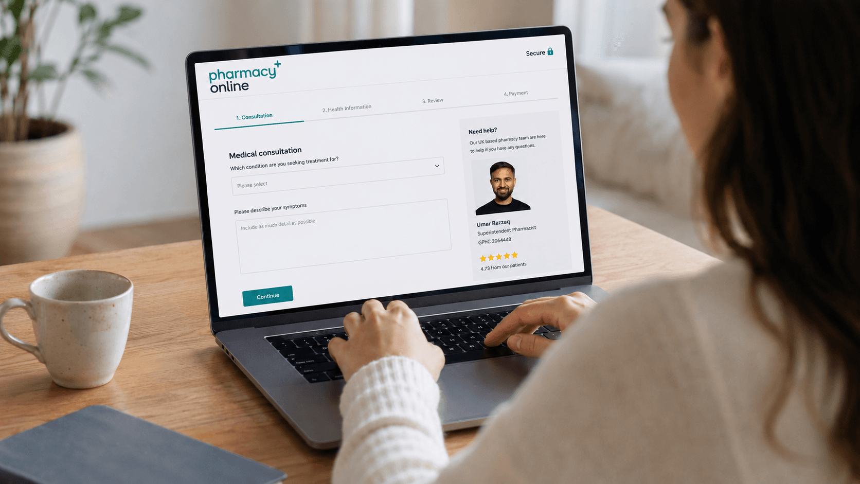 Person completing an online pharmacy consultation on a laptop using the Pharmacy Online website.