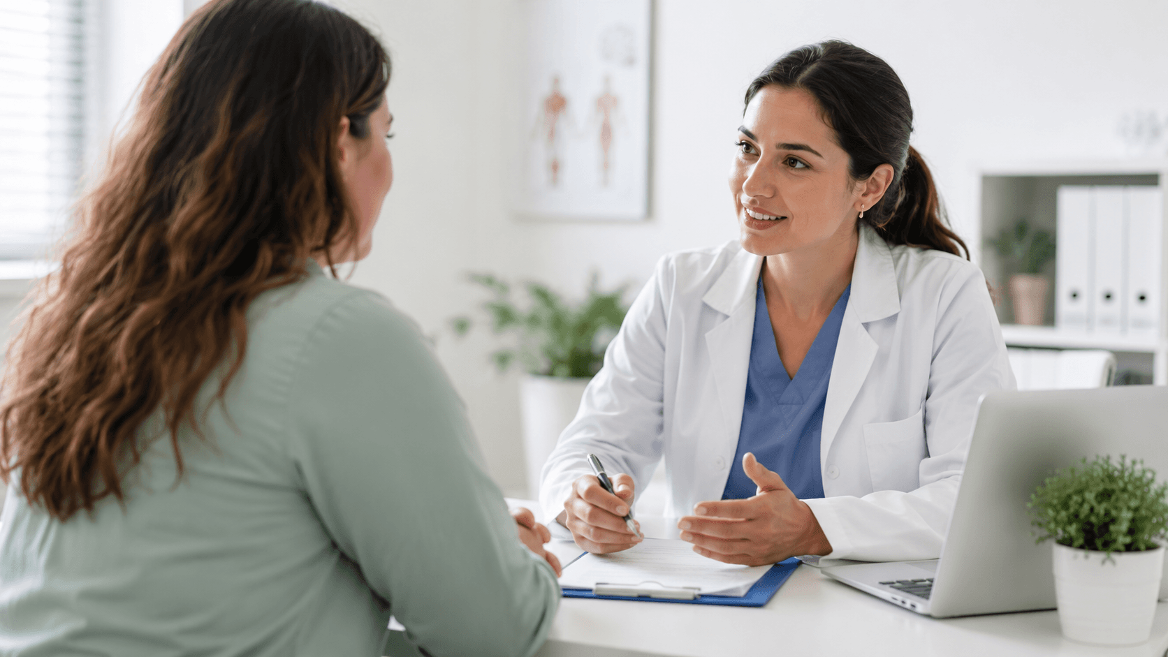 Doctor consulting with a patient in a modern medical clinic, discussing treatment options during a face-to-face appointment.